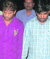 The accused in police custody. 