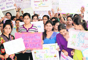 Students of Postgraduate Government College for Girls, Sector 11, take part in an anti-cracker rally in Chandigarh on Wednesday. 