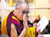 The Dalai Lama takes part in a special prayer service at the main temple at McLeodganj in Dharamsala 