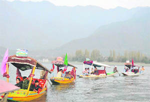 Shikaras line up on the Dal Lake in Srinagar as the two-day Shikara festival gets under way on Wednesday. 
