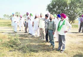 Farmers being shown land