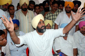 PPP supremo Manpreet Singh Badal gestures while addressing mediapersons in Bathinda on Thursday. 