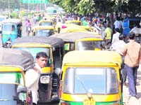 Auto-rickshaws lined up outside the ISBT-43 even as passengers complained of overcharging by its drivers during a strike by the roadways staff in Chandigarh on Thursday.