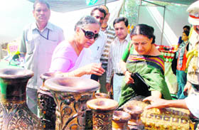 Uttarakhand Governor Margaret Alva has a look at exhibits at the Crafts Bazar in Dehradun on Thursday.