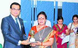 IGP Rajbir Deswal receives a memento from Pro-Vice-Chancellor Dr Balbir Kaur at a function in BPS Women University, Khanpur alan.