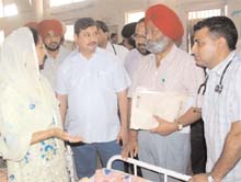 Bathinda MP Harsimrat Kaur Badal speaks to the doctors during her surprise visit to the Civil Hospital on Friday.