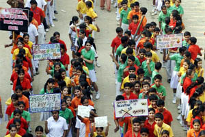 Schoolchildren participate in a rally in Faridabad to discourage the use of crackers at Divali