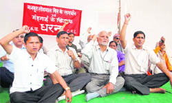 CPI workers stage a protest at the Parade Ground in Dehradun 