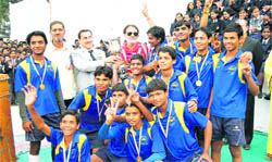 The team of LBM School, Jhansi, with the All-India Inter-school Richard Carr Hockey Tournament trophy in Mussoorie 