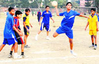 A match under way in the District-level Handball Tournament played at the Parade Ground in Dehradun