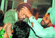 One of the victims being rescued from the spot