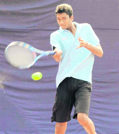 Gurinder Singh in action during the final of the PU Inter-College Tennis Championship in Chandigarh on Saturday. Tribune photo: Manoj Mahajan