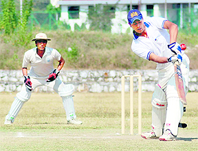 A batsman in action in a match in the Inter-college Cricket Tournament of Uttarakhand Technical University in Dehradun on Saturday. 