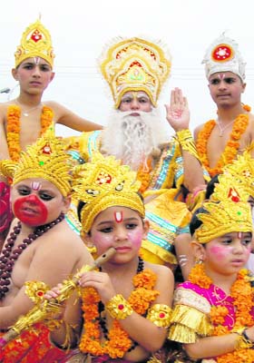 Devotees participate in the Vishwakarma Shobha Yatra in Jammu on Saturday