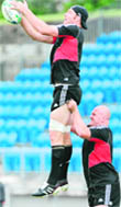 New Zealands Ali Williams (L) is lifted by Ben Franks during their training session in Auckland on Saturday. New Zealand will face France during the 2011 Rugby World Cup final to be held on October 23.