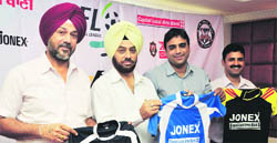 Organisers of the Edu-Football League unveil the jerseys in Rurka Kalan village, near Jalandhar.