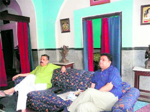 Raja of Ayodhya Vimlendra Mohan Pratap Mishra and Rajkumar Yatindra Mishra at the royal palace