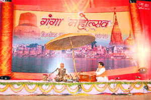 Pandit Vishwamohan Bhatt gives a performance during the Ganga Mahotsava