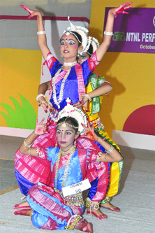 Schoolchildren take part in a classical dance competition during the closing ceremony of MTNL Perfect Health Mela at Laxmi Bai Nagar in New Delhi on Sunday.