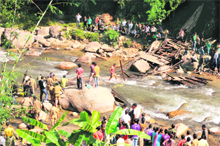 Villagers gather at the bridge collapse site at Bijonbari village in West Bengals Darjeeling district.