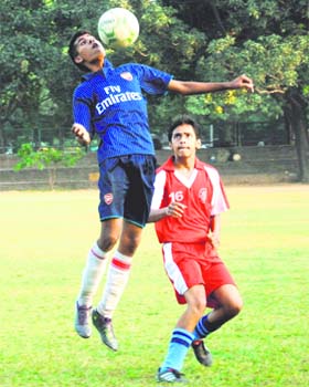 Players in action during the CBSE Cluster XIII Football Tournament at Sector 17, Chandigarh, on Monday