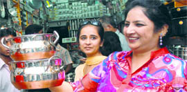 Women are busy shopping for utensils on the occasion of Dhanteras in Jalandhar on Monday.