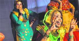 Girls performe giddha during the youth festival at the PAU in Ludhiana.
