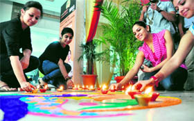 INFD students light diyaas on the occasion of Diwali in Ludhiana.