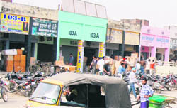 Traders stock firecrackers outside their shops at Patakha Market in Amritsar