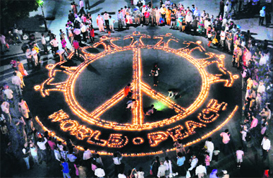 Beautifully laid-out earthen lamps, calling for world peace, on display on Diwali eve in Chandigarh. Tribune photo: Manoj Mahajan