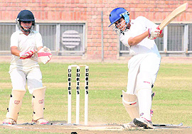 A player in action during a cricket match at St Anne School in Sector 45, Chandigarh, on Tuesday. Tribune photo: Manoj Mahajan
