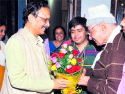 Uttarakhand Chief Minister BC Khanduri greets former Chief Minister Nityanand Swami on the eve of Diwali in Dehradun on Tuesday.