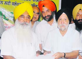 Education Minister Sewa Singh Sekhwan (left) and former VC of GND University, Dr SP Singh, declared the proposed eduction policy in Jalandhar on Tuesday
