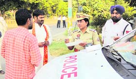 Sub Inspector Balwinder Kaur is ready with her team to nab traffic violators in Jalandhar
