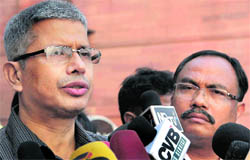 ULFAs chairman Arabinda Rajkhowa (R) and its foreign secretary Sashadhar Choudhury talk to mediapersons after their meeting with Union Home Secretary RK Singh in New Delhi on Tuesday
