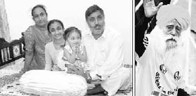 Harwinder Singh, son of Fauja Singh (above), with his family at Beas village in Jalandhar