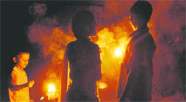 Slum children burst crackers to celebrate Diwali in Panckhula.