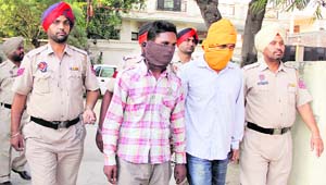 The accused in police custody in Jalandhar on Thursday. 
