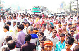 Grain dealers block the Ambala-Hisar highway in protest against alleged police inaction on Friday.
