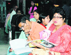 A family has anxious moments waiting for its train at the railway station following the cancellation and change of routes of many trains.