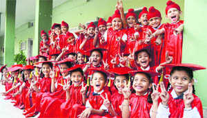 Children in a joyous mood during their graduation ceremony at GN International Public School, Model Town, in Ludhiana on Friday. 