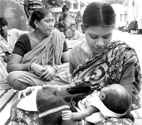 A mother with her baby after being released from Dr BC Roy Children's Hospital in Kolkata on Friday.