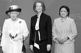 (From left): Britain's Queen Elizabeth II, Australian Prime Minister Julia Gillardand Trinidad and Tobago's Prime Minister Kamla Persad-Bissessar at the Commonwealth Heads of Government Meeting in Perth on Friday.