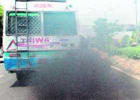 A Haryana Roadways bus adds to the air pollution near the Panchkula bus stand