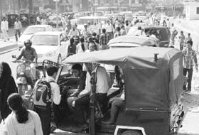 Autorickshaws parked in a haphazard manner on a road at Zirakpur