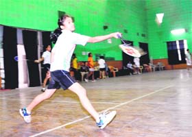 A player in action in the District Badminton Tournament in Dehradun on Saturday