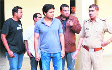 Functionaries of DNA, the promoter of the Metallica band concert, in police custody at Gurgaon on Saturday.