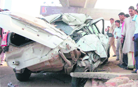 Mangled remains of a car that hit a metro pillar near IFFCO Chowk in Gurgaon on Saturday, killing three persons. 