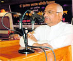 Suresh Soni, senior RSS functionary, addresses a seminar in Shimla on Saturday