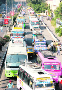 A traffic jam on the busy BC Road in Jammu on Saturday. 